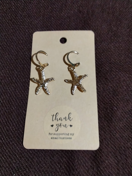Gold starfish hoop earrings