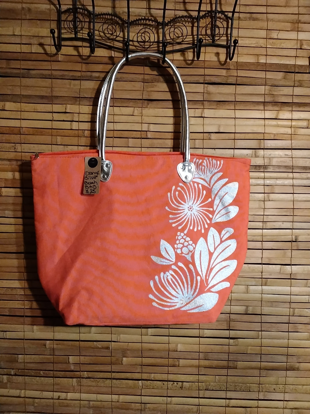 Hawaiian floral print canvas beach bag.