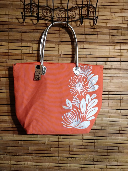 Hawaiian floral print canvas beach bag.