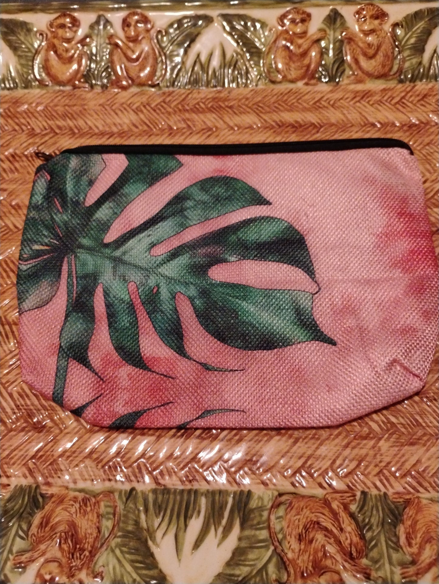 Pink montstera makeup bag