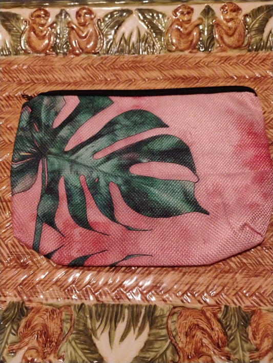 Pink montstera makeup bag